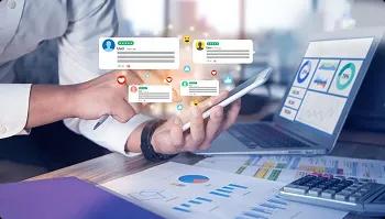 Tablet shows analytics dashboard with message notifications for shipment updates