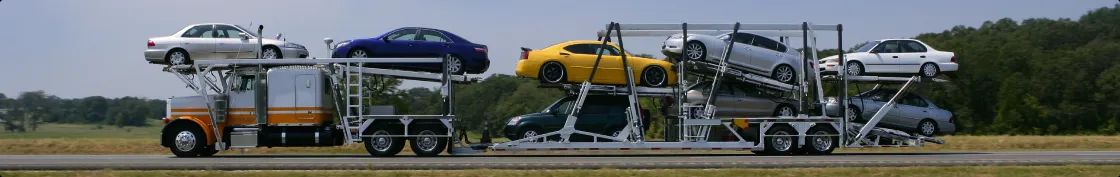 Open car hauler multi vehicle transport open car hauler truck transporting multiple vehicles across the highway