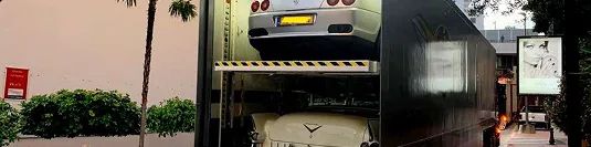 Enclosed double deck car trailer enclosed double deck trailer transporting luxury and classic cars