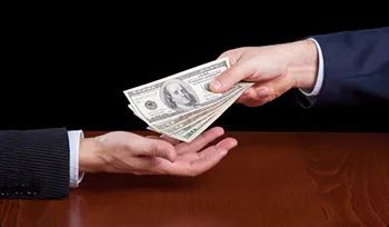 Money back guarantee hand giving cash representing money back guarantee for expedited service