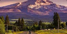 Oregon Car Shipping Scenic road leading toward Mount Hood with trees and fields in foreground