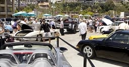 Car meet and event transport made easy outdoor car meet with classic and sports cars displayed in bright sunny weather