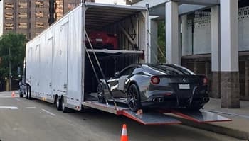 Enclosed car transport for luxury vehicles enclosed trailer loading luxury sports cars for secure auto transport