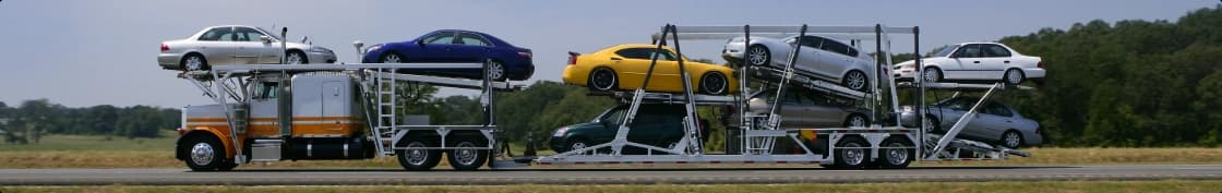 Open car hauler multi vehicle transport open car hauler truck transporting multiple vehicles across the highway