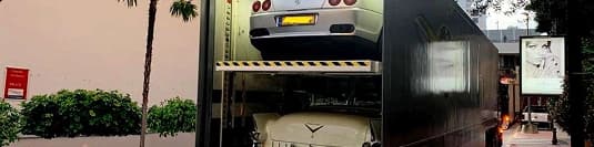 Enclosed double deck car trailer enclosed double deck trailer transporting luxury and classic cars