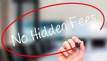 No Hidden Fees Hand circles the words No Hidden Fees in red on glass, pricing transparency concept