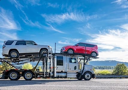 Multi Car Shipping Calculator Auto Transport Carrier multi car shipping calculator showing multiple vehicles loaded on an auto transport carrier