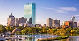 Boston to Naples car shipping Waterfront skyline at golden hour representing Boston to Naples car shipping route